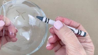 She draws crayon lines on a glass bowl for a spectacular porch lighting idea!