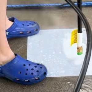 She sprays water on her sidewalk for this brilliant idea!