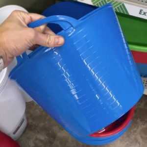 The brilliant reason she buys a plastic Dollar Store bucket!