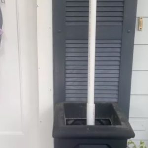 She sticks PVC pipes in a planter around her door and the result is so wild!