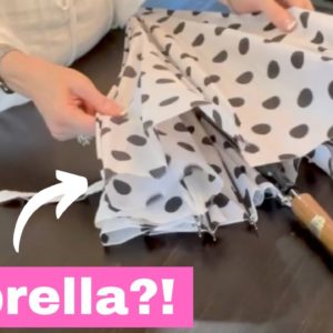 She grabs an umbrella for this genius decor hack!