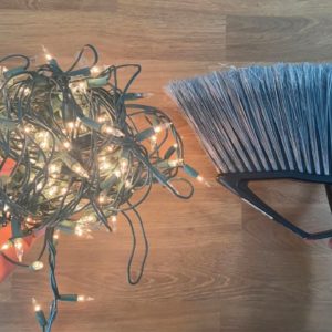 Wrap string lights around a broom for this AMAZING idea!