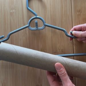 Slide a paper towel roll onto a hanger (this is BRILLIANT!)