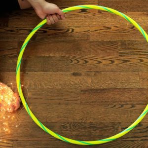 Wrap string light around a hula hoop for this GORGEOUS lighting idea!