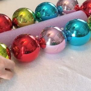 Stick an ornament to a pool noodle for this BRILLIANT Christmas hack!