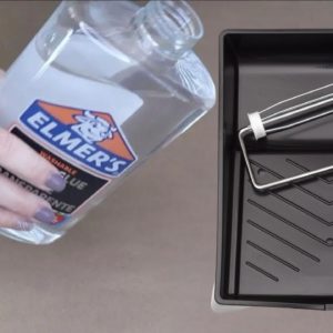 Pour Elmer's Glue into a paint tray for this BRILLIANT idea!