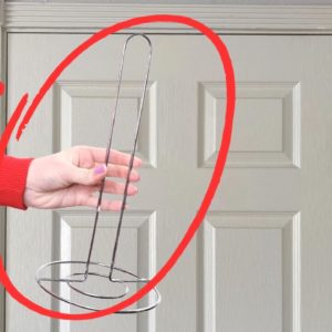 Stick a paper towel holder on your door (BRILLIANT!)