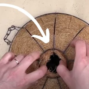 Cut a hole in a flower basket for this GENIUS porch hack!