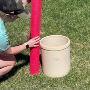 Stick a pool noodle into a planter for this brilliant front porch idea!