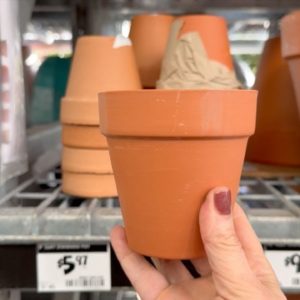 Drill holes into a pot for this BRILLIANT front porch idea!