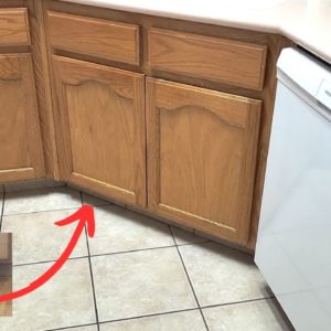 Stick command hooks UNDER your kitchen cabinets (this is brilliant!)